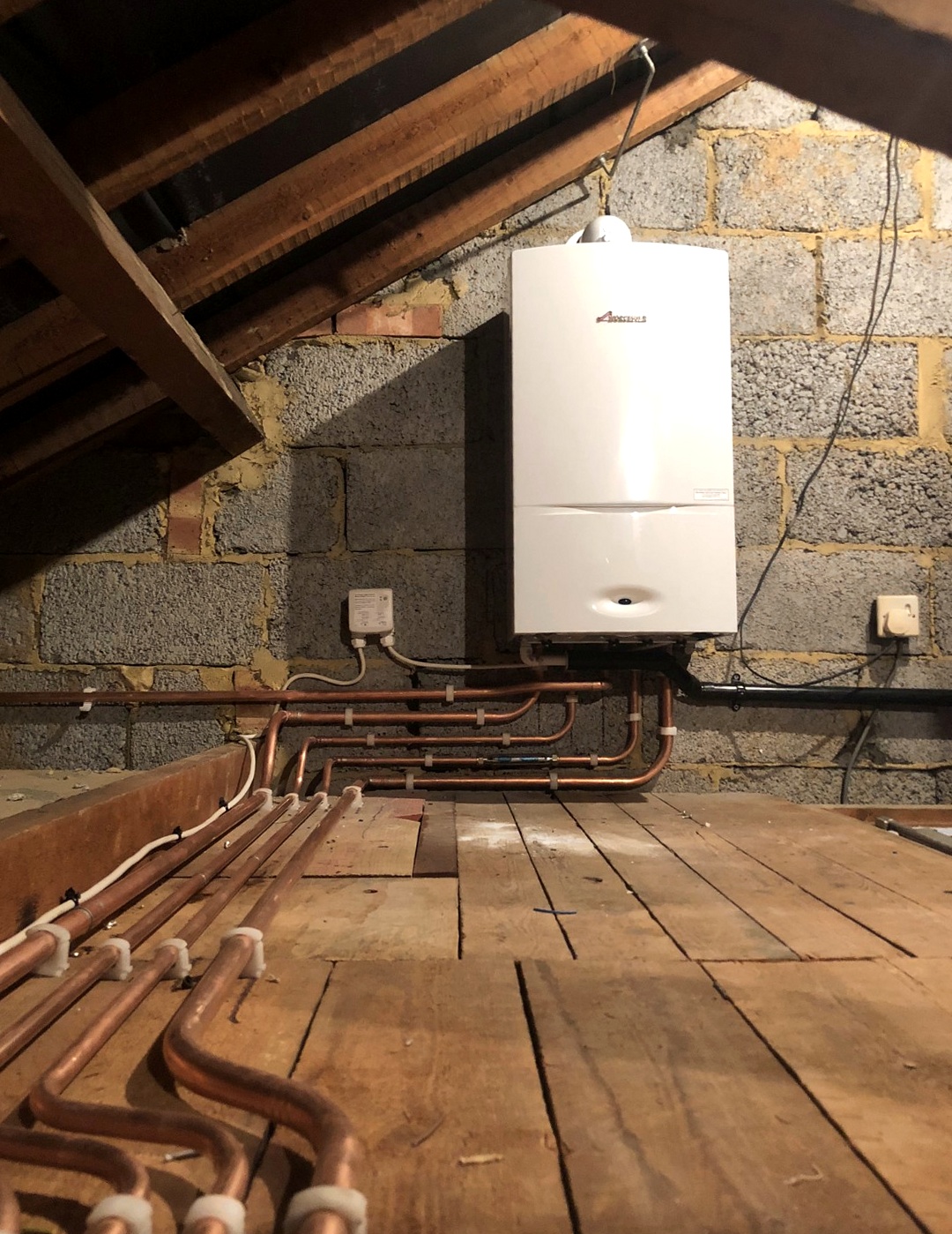 Worcester Bosch boiler installation in loft with copper pipework